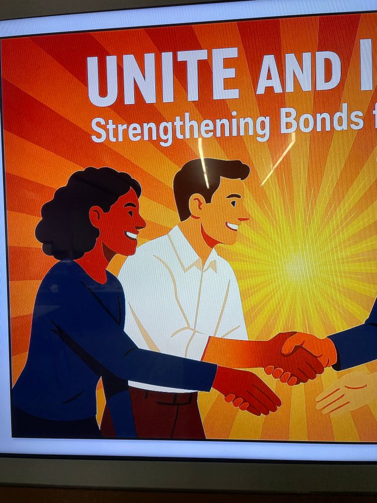 Image of two people reaching to shake hands, taken from a larger motivational poster
