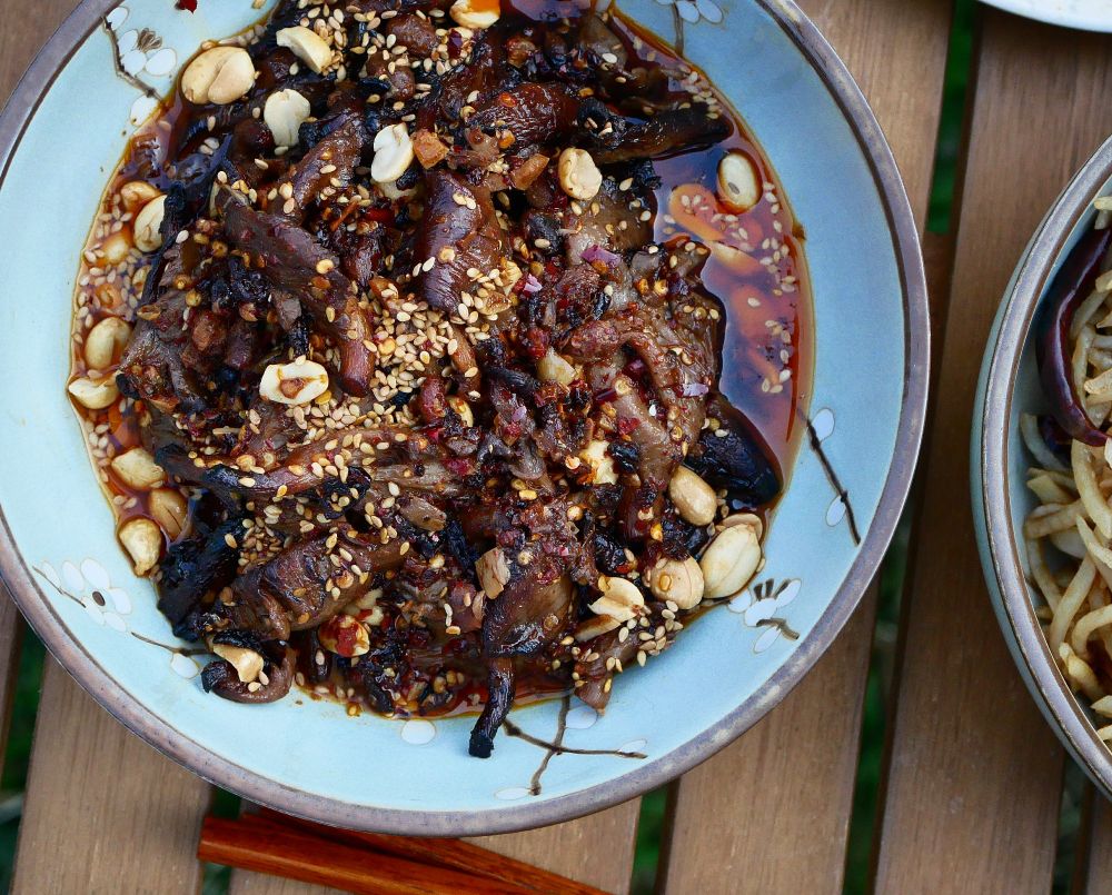 Top view of oyster mushroom in dark red sauce