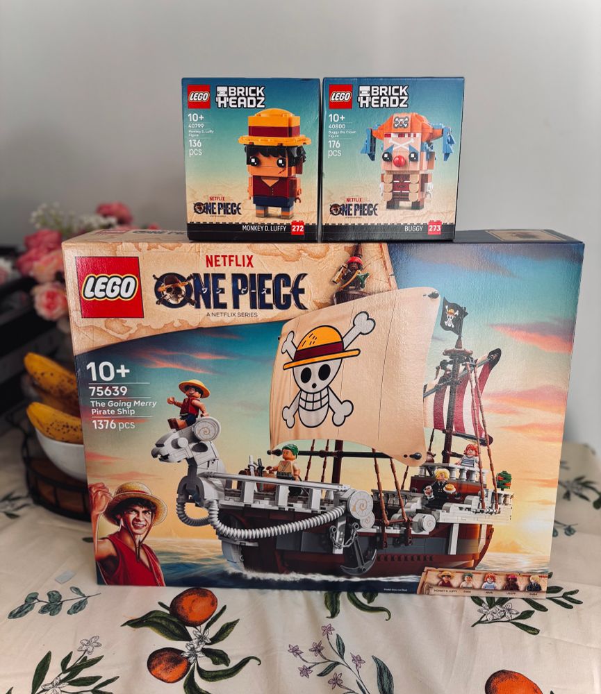 the netflix one piece ship lego set with luffy and buggy brick heads on top