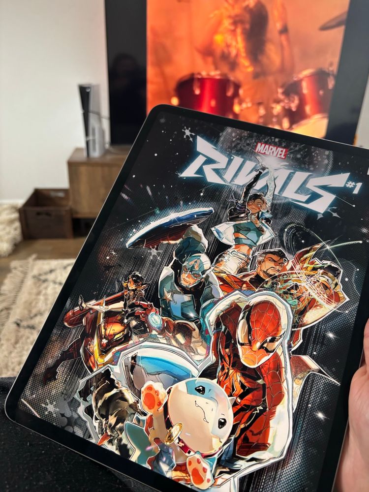 marvel rivals on an ipad held by nosku
