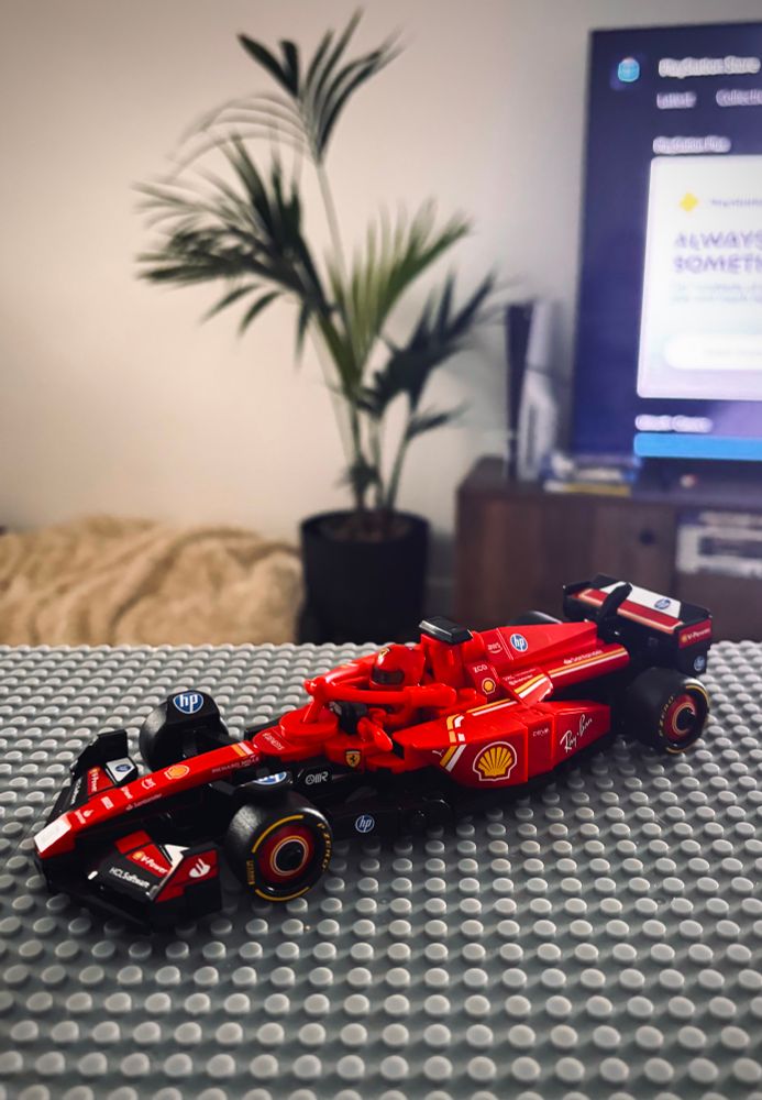 a lego ferrari car on a lego table