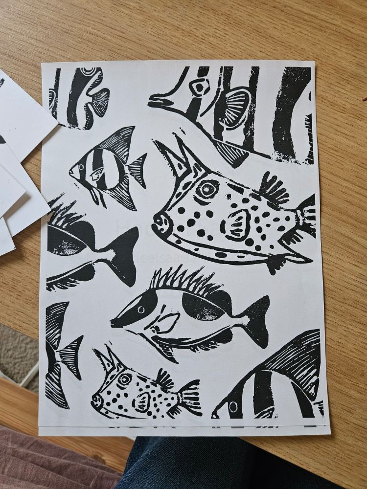 Print of linocuts of boxfish, spadefish, butterfly fish, and rabbitfish