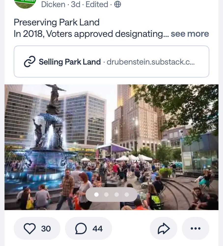 a screenshot of a nextdoor post. the post text is titled “preserving park land” and then the summary of the text ends. the image is a fever dream with strange buildings hovering over a plaza full of hallucinated people walking amongst strange other-worldly fountains and such. the actual reality of the location is a parking lot that has been a parking lot since the 1940s, and has no actual people on it basically ever. 