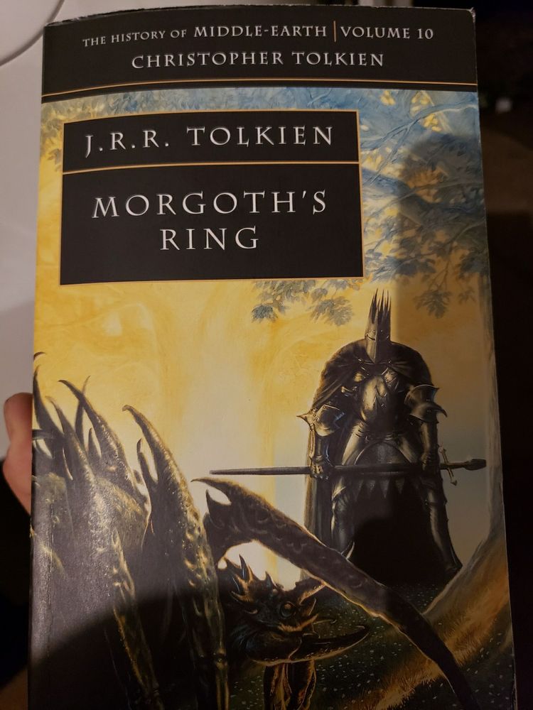 cover of the book Morgoth's Ring by Christopher Tolkien, the History of Middle Earth Volume 10. Cover art is the gold and silver trees of Valinor, Morgoth in the form of a black knight and Ungoliant the giant spider stand in front of the trees.