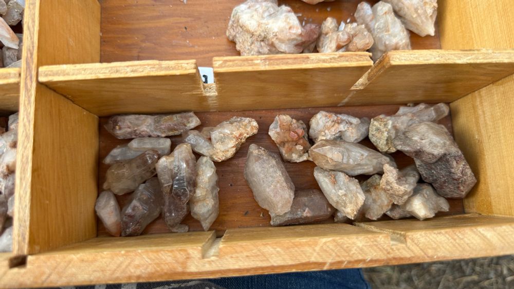 quartz crystals in a wooden box 