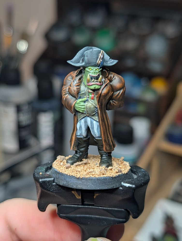 Ork miniature painted in contrast paints and some acrylics 