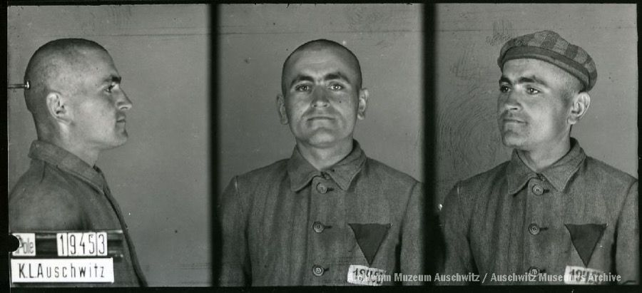 A mugshot registration photograph from Auschwitz. A man with a shaved head wearing a striped uniform photographed in three positions (profile and front with bare head and a photo with a slightly turned head with a hat on). The prisoner number is visible on a marking board on the left.