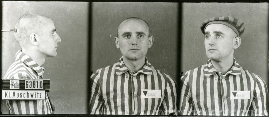 A mugshot registration photograph from Auschwitz. A man with a shaved head wearing a striped uniform photographed in three positions (profile and front with bare head and a photo with a slightly turned head with a hat on). The prisoner number is visible on a marking board on the left