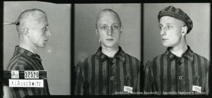 A mugshot registration photograph from Auschwitz. A man with a shaved head wearing a striped uniform photographed in three positions (profile and front with bare head and a photo with a slightly turned head with a hat on). The prisoner number is visible on a marking board on the left.