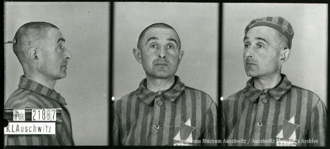 A mugshot registration photograph from Auschwitz. A man with a shaved head wearing a striped uniform photographed in three positions (profile and front with bare head and a photo with a slightly turned head with a hat on). The prisoner number is visible on a marking board on the left.