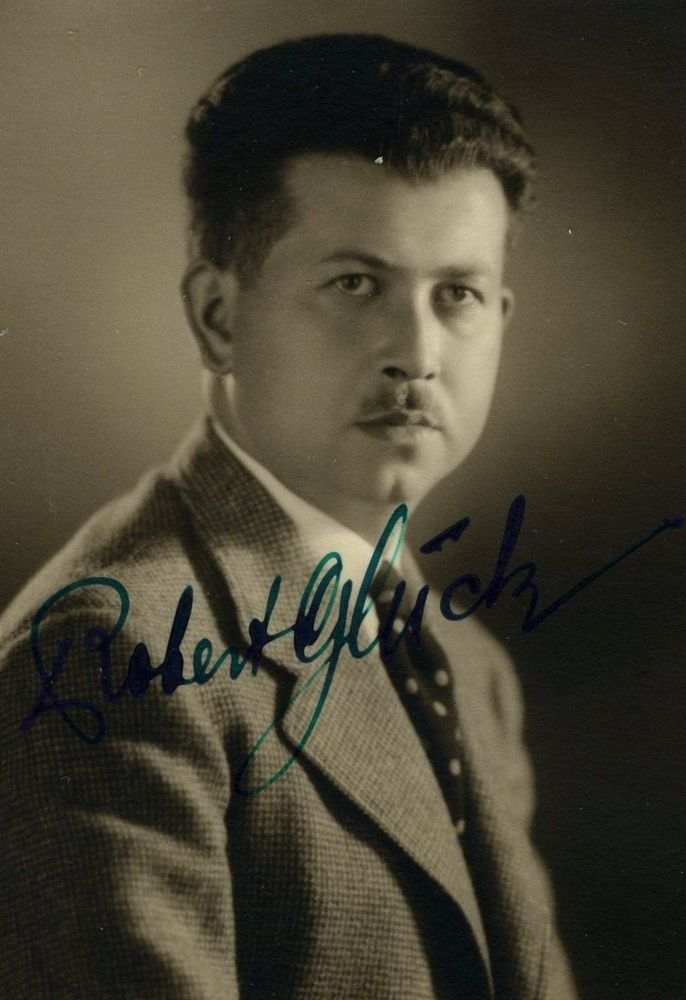 Vintage portrait of a man in a suit with a signed inscription "Robert Glück.