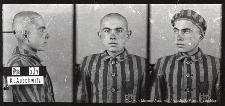 A mugshot registration photograph from Auschwitz. A man with a shaved head wearing a striped uniform photographed in three positions (profile and front with bare head and a photo with a slightly turned head with a hat on). The prisoner number is visible on a marking board on the left.