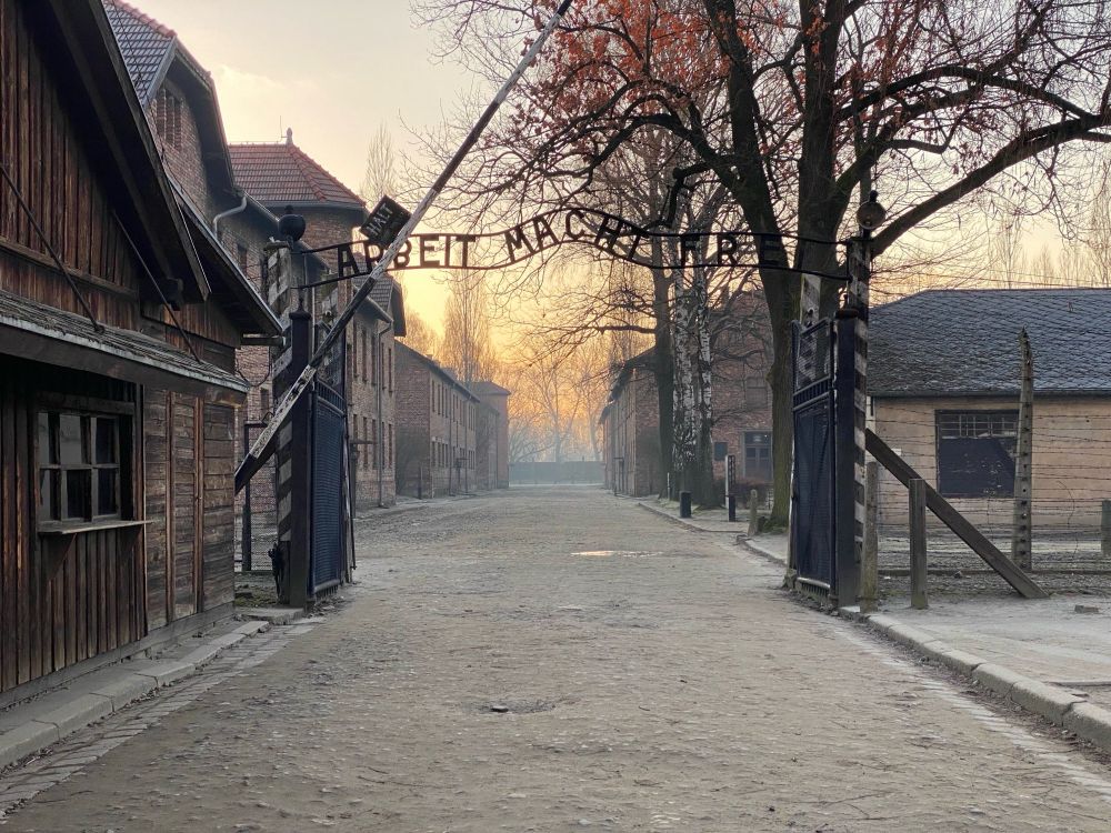 The main gate of the former Auschwitz I camp with the 'Arbeit macht frei inscription. 