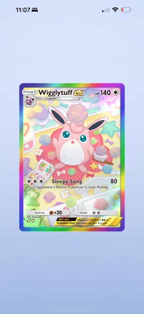 In-game mobile screenshot from Pokémon TCGP of a fully illustrated Wigglytuff EX card with a rainbow border