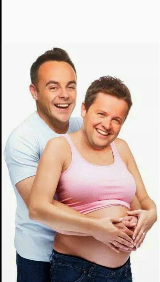 A picture of a pregnant person with their partner's arms wrapped round their stomach with the TV presenters Ant and Dec's faces photoshopped onto their faces
