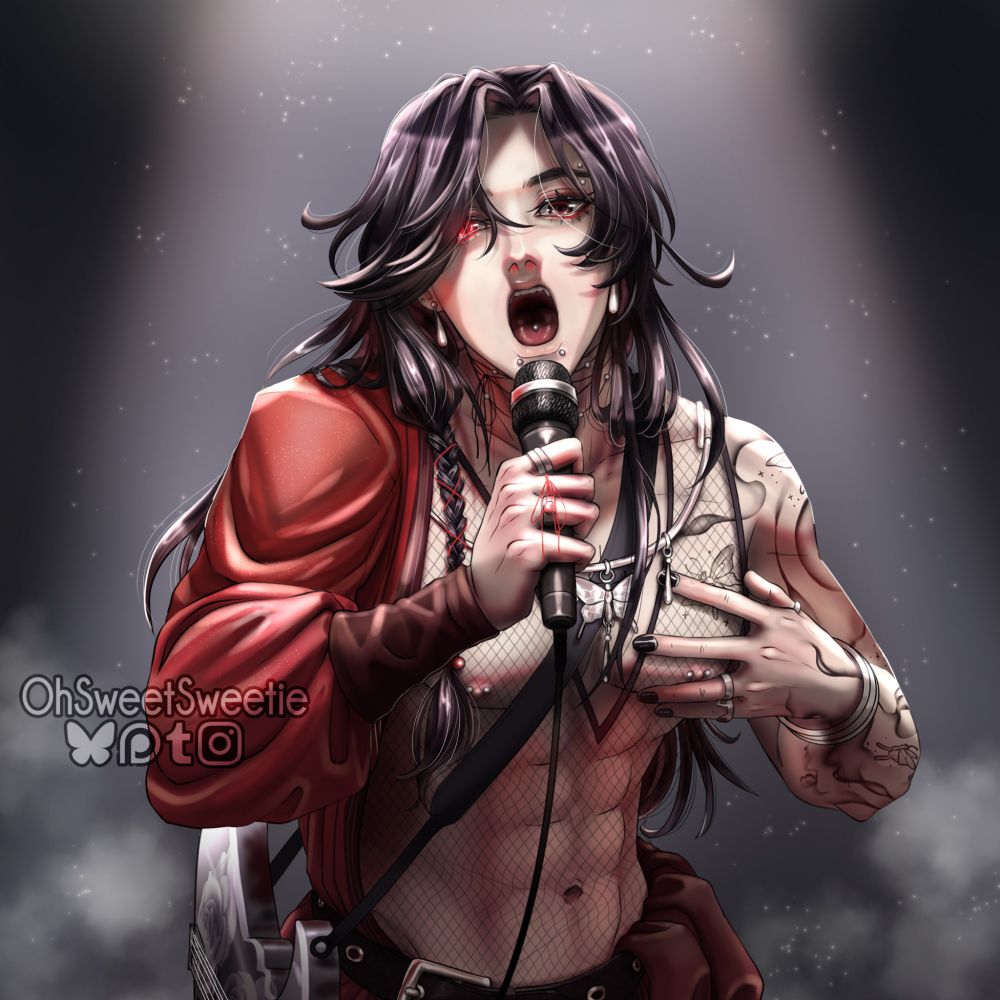 The image is a hips-up view of Hua Cheng singing into a microphone held in his right hand, his left caressing his chest. On his left arm and shoulder is a tattoo sleeve depicting wispy smoke trails and glittering butterflies. His hair is waist length and unruly, but he has a long braid hanging over his right shoulder adorned with a red pearl at the end. His right eye is glowing bright red with a slit pupil, the left is a normal desaturated brown. On his shoulder,  pushed out of the way and barely visible is a silver guitar. He's wearing a long red jacket that cinches on his forearm where the sleeve turns skin tight. Only the right side is worn properly, the left side hangs down, only held up by the belt around his waist. Under the jacket is a v-neck fishnet tank top. He has several rings on his fingers including the red string of fate. He also has several piercings which all have silver ball studs: his left eyebrow, his tongue, snake bites, upper earlobes, and nipple piercings. His ears also have teardrop earrings. Across his collar is a silver necklace with a large butterfly pendant and teardrops matching his earrings. Around his neck is a thin string tied in a bow with a few round silver beads dotted in places. He's on dark stage with a bright spotlight lighting him from the front.