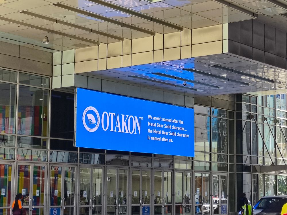 Otakon's LED sign, displaying the quote:

"We aren't named after the Metal Gear Solid character. The Metal Gear Solid character is named after us."
