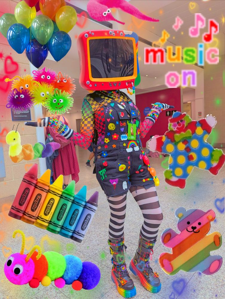 Photo of me in 'TV Head' cosplay. The photo is decorated with kidcore stickers.