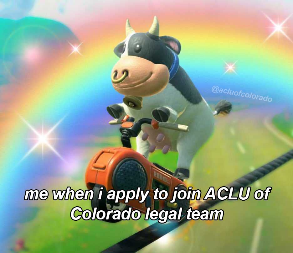 an adorable cow pops a wheelie on a motorcycle on a steel wire. behind the cow, there are rainbows and sparkles. text at the bottom reads, "me when i apply to join ACLU of Colorado legal team."
