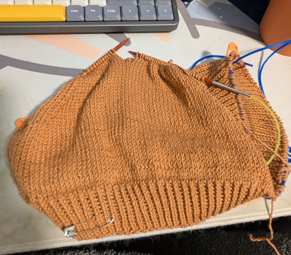 Light orange knitting project that is in progress 