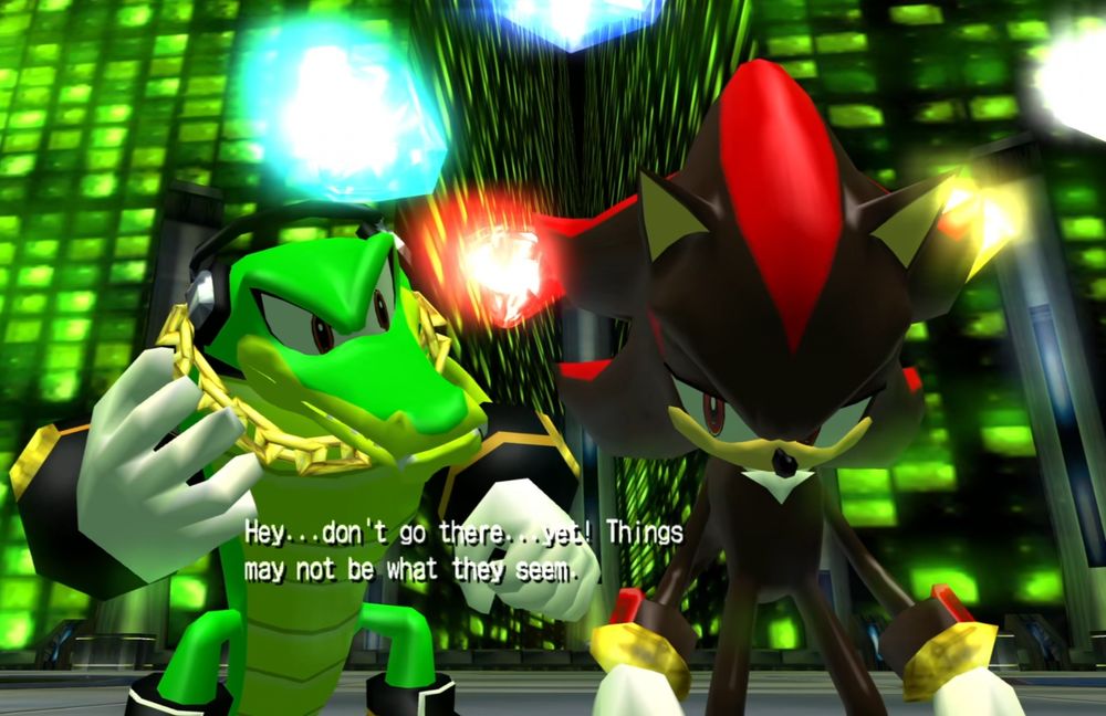 Shadow the Hedgehog screenshot showing a clearly depressed Shadow and Vector trying to comfort him by saying "Hey...don't go there...yet! Things may not be what they seem."