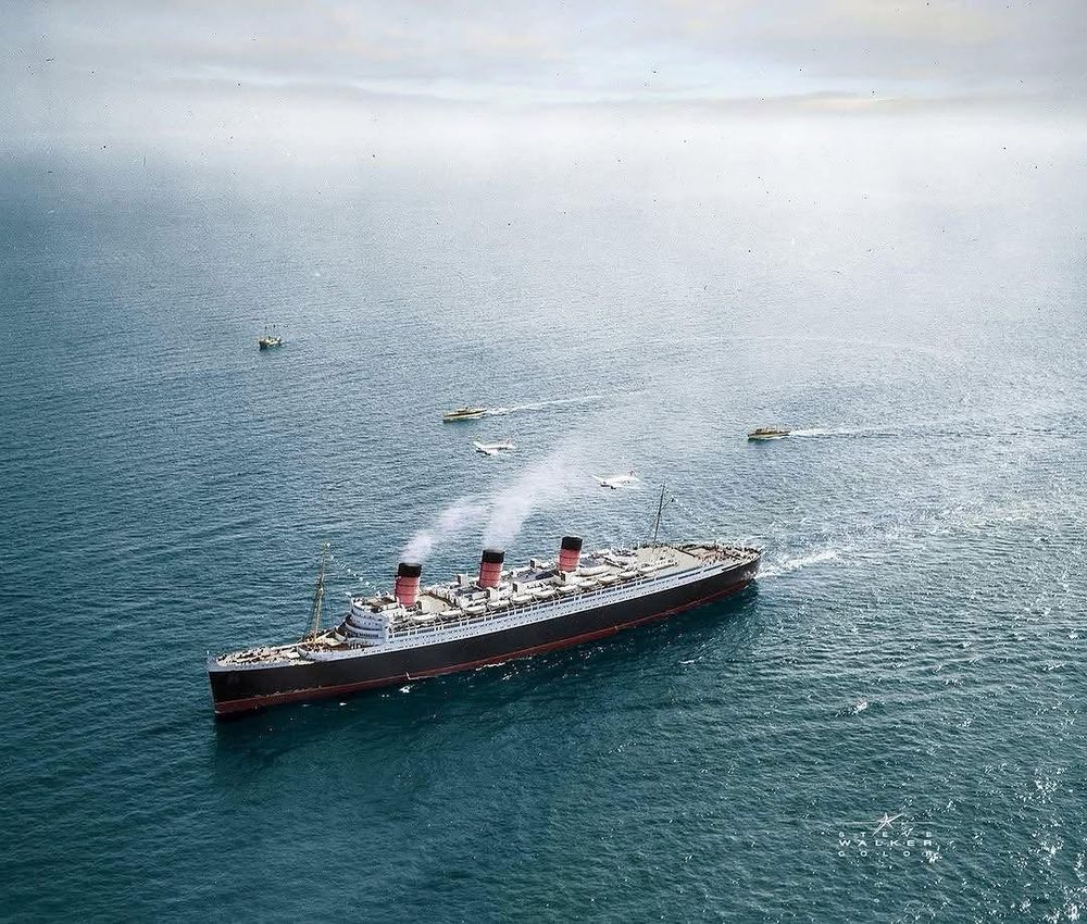 Aerial photo of RMS Queen Mary on a routine voyage, colorized by Steve Walker