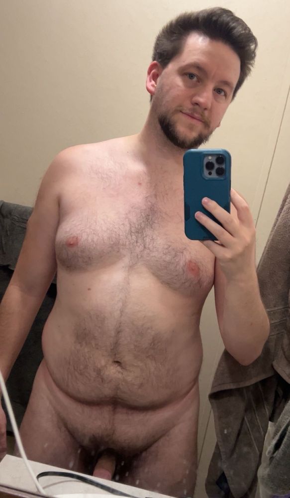 Naked mirror selfie with the sink counter obscuring half my dick