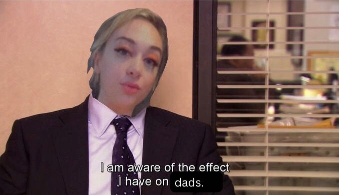 Delilah’s face on the body of Charles from the office with the text “I am aware of the effect I have on [dads]”