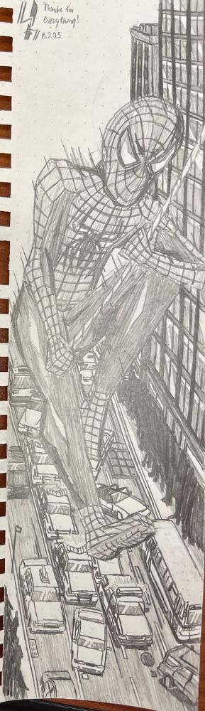 spider man swinging through the city with an array of police cars going after something below.