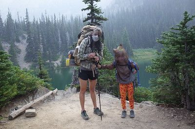 me and kid wearing masks and bug nets