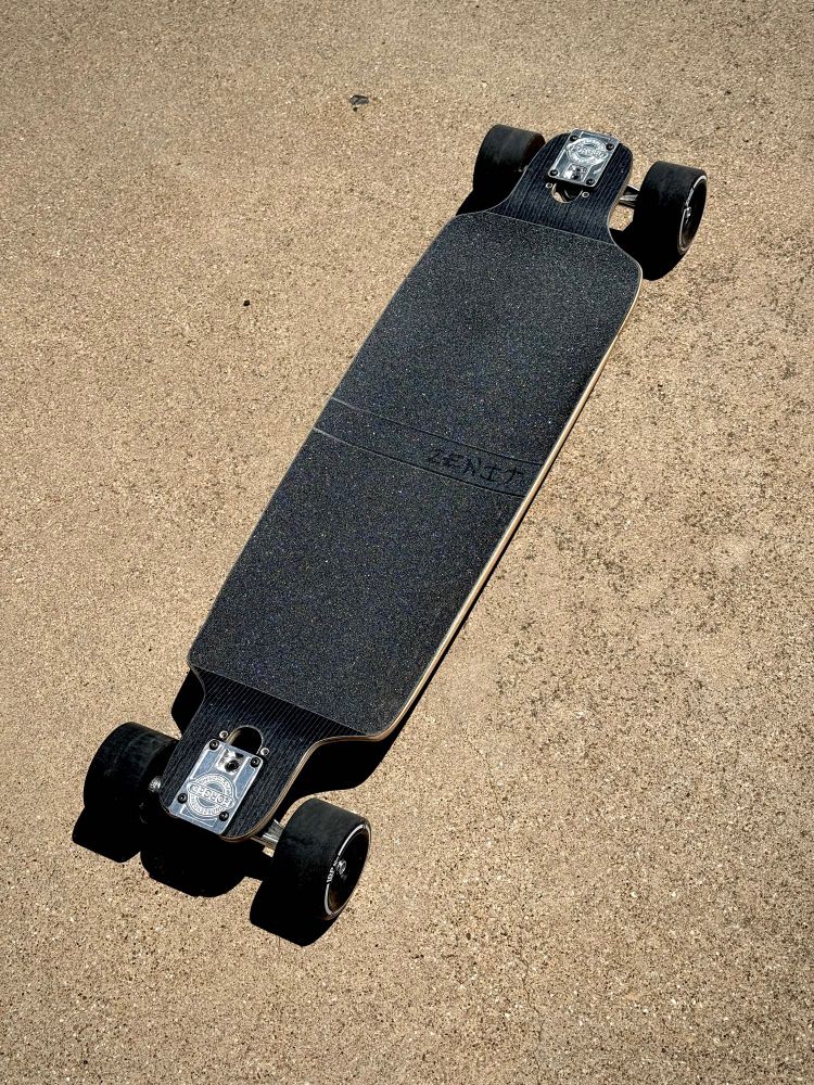 A Canadian made Zenit AB 3.0 longboard. Fun ride. Easy to push mile after mile. 
