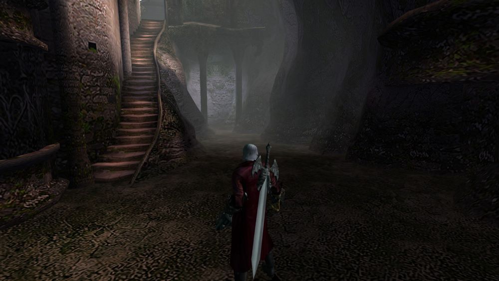 Devil May Cry

dante standing in an cramped area that looks eerily similar to the dark souls 1 capra demon arena (a small alleyway with a tiny staircase going up to the left)