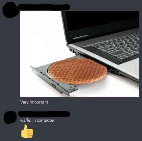 image of a laptop with her cd drive open but instead of a cd it has a stroopwaffle in it 
