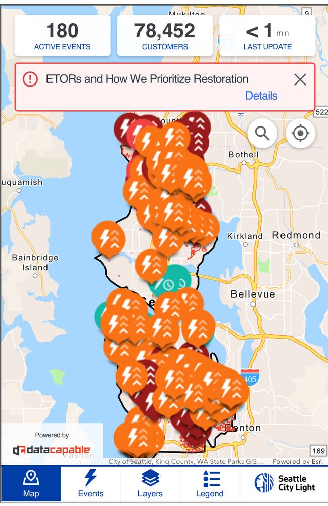 A map of Seattle labeling all the power outages with red and orange markers. Most of the city is covered in orange lol