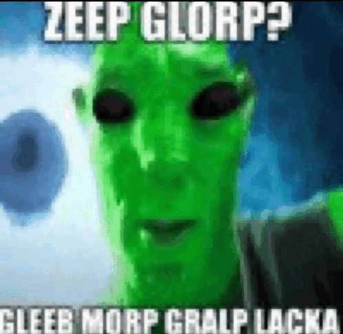 a navi from james cameron's avatar photoshopped to look like a green alien, captioned "zeep glorp? gleep morp gralp lacka"