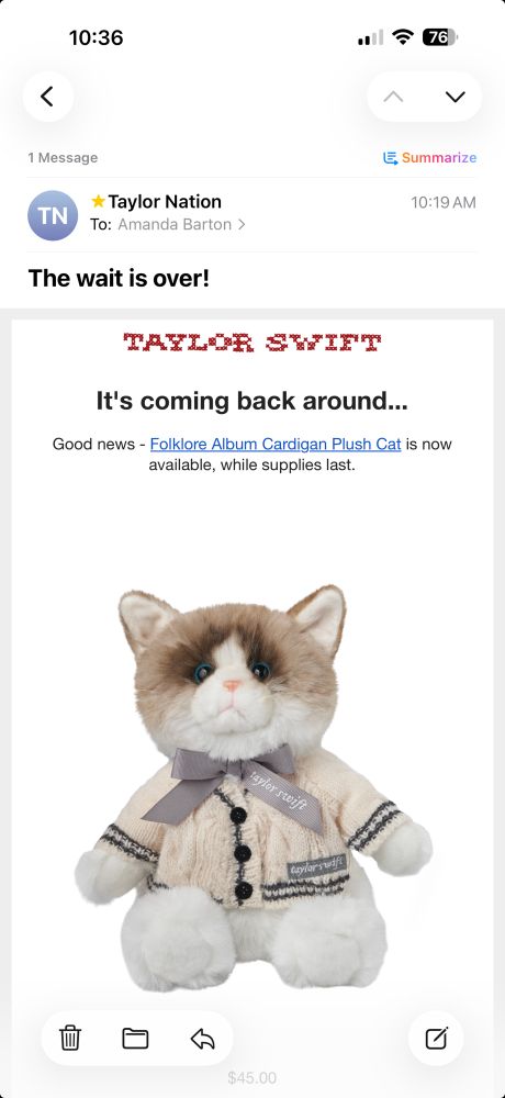 Screenshot of an email from Taylor Nation saying the Folklore Album Cardigan Plush Cat is now available with a photo of the cat in a cardigan sweater 