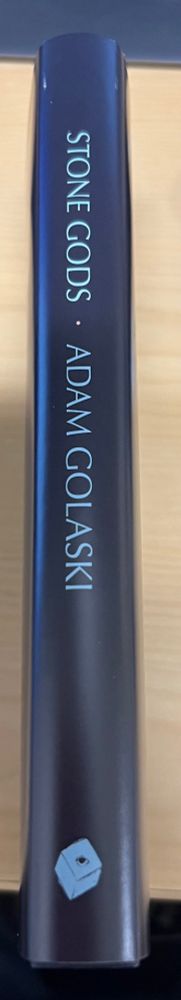 The spine of the ltd numbered edition hardcover of Adam Golaski’s STONE GODS.