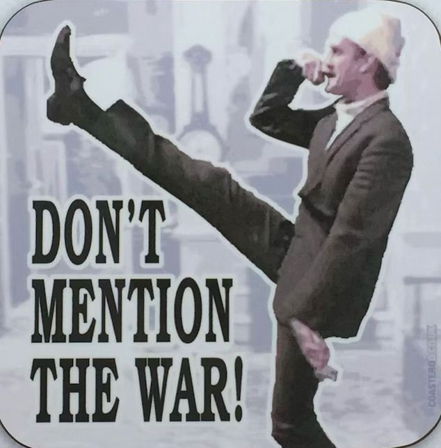 John Cleese as Basil Fawlty, and the text Don’t mention war!