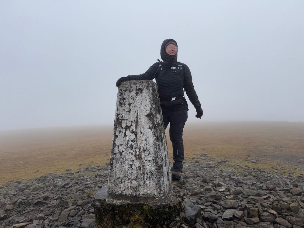 Woman at a trig not looking anywhere near the camera