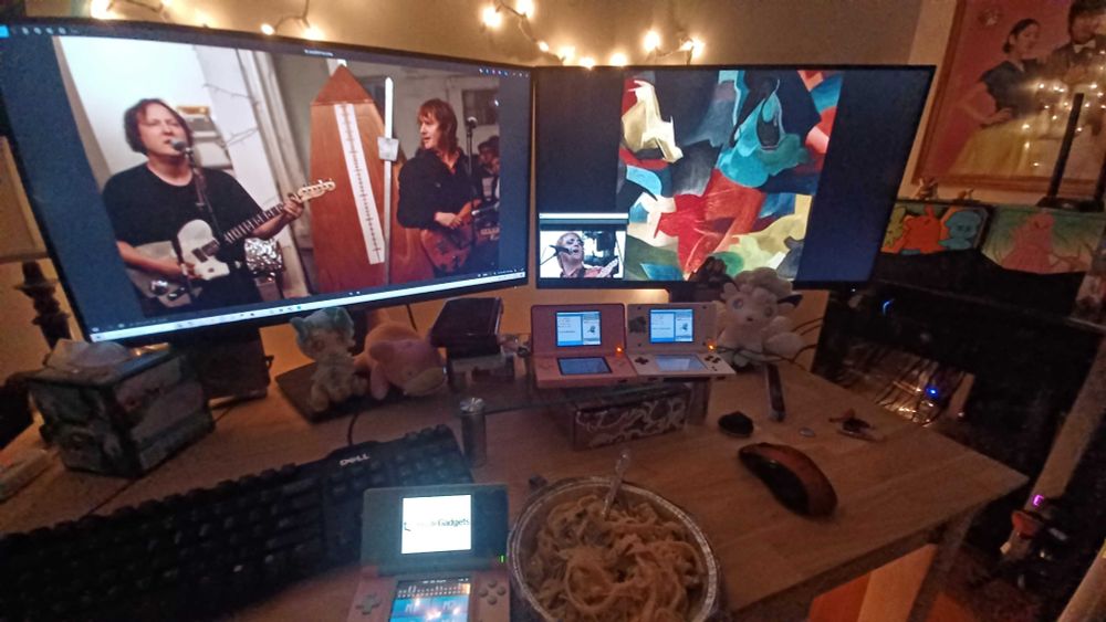 A picture of Will Cullen is displayed on one monitor, the other is the album cover of Black Foliage, with a small media player playing a Oliva Tremor Control concert. While I'm hunting Tentacool and eating Fettuccini 