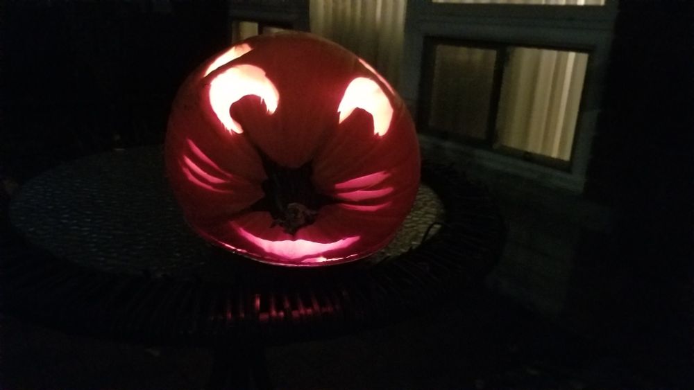 Pumpkin carved  with the face of a mouse or rat