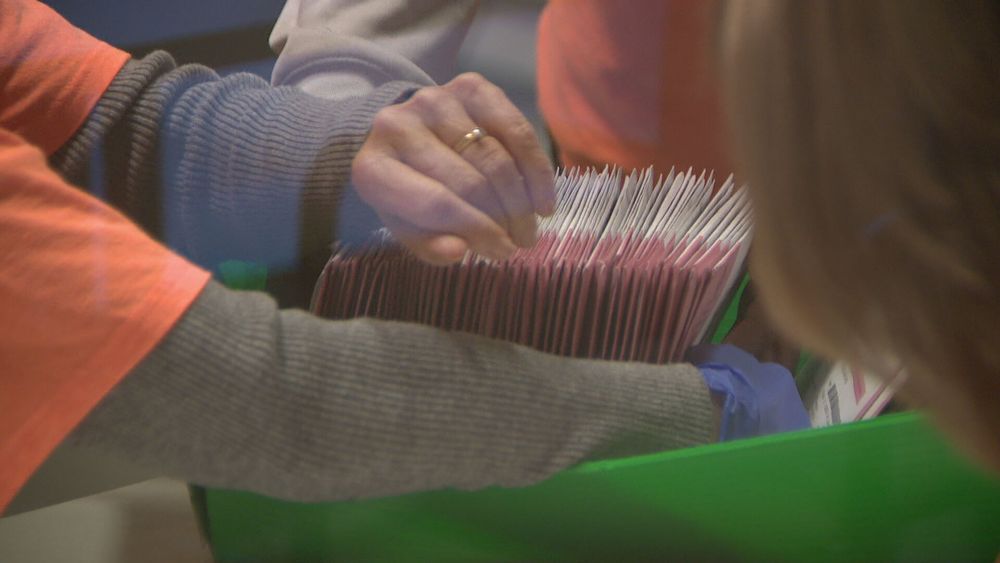 Election worker sorting through mail ballots in Clark County, Nevada