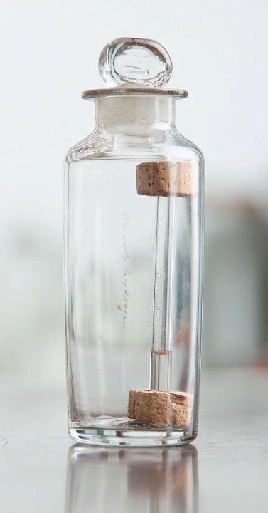 Faraday's sample of benzene, a tiny vial with almost colourless liquid