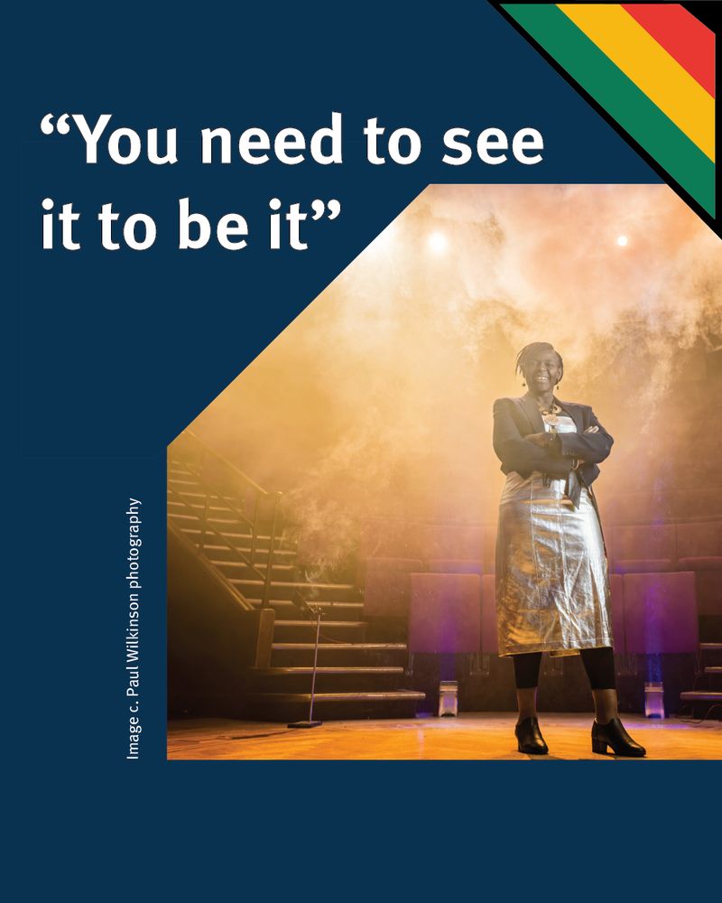Quote: "You need to see it to be it" An image of a black woman standing in a smoky Theatre with her arms crossed.