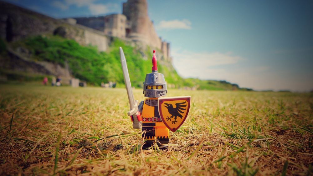 A Lego knight guards the large patch of grass outside of Bamburgh Castle, Northumberland. There will be no picnics on his watch.