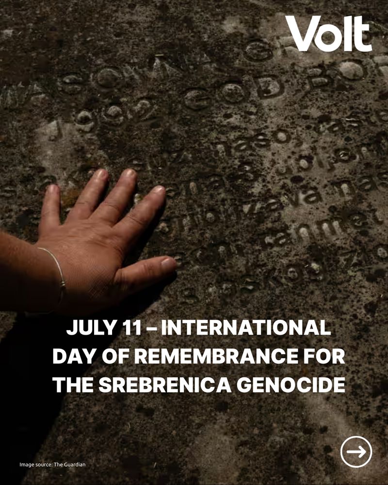 A hand with a bracelet rests on a weathered, carved stone surface. Text overlays read "JULY 11 - INTERNATIONAL DAY OF REMEMBRANCE FOR THE SREBRENICA GENOCIDE" and "Image source: The Guardian." The Volt logo is in the top right corner.