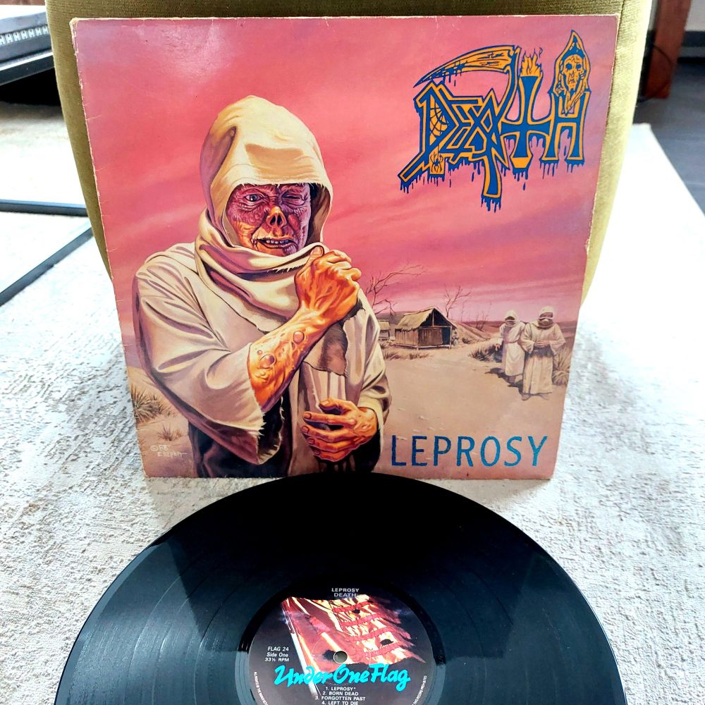 Death - Leprosy

Under One Flag
1988
Black vinyl

And "Death" (Metal) goes on...

#Death #Leprosy #ChuckSchuldiner #DeathMetal #OldSchoolDeathMetal #RickRozz #TerryButler #BillAndrews #MetalVinyl #VinylCollection #NowSpinning #Metalhead #MetalVinylCollection #ExtremeMetal #DeathMetalVinyl #VinylAddict #DeathMetalLegend #VinylCommunity #MetalVinylClub #ClassicDeathMetal #FloridaDeathMetal #UnderOneFlag #VinylCollector #MetalForever #BrutalMetal #MetalVinylLovers #HeavyMetalVinyl #1988Metal #MetalMilestone #Schallplatten #DeathMetalHistory
