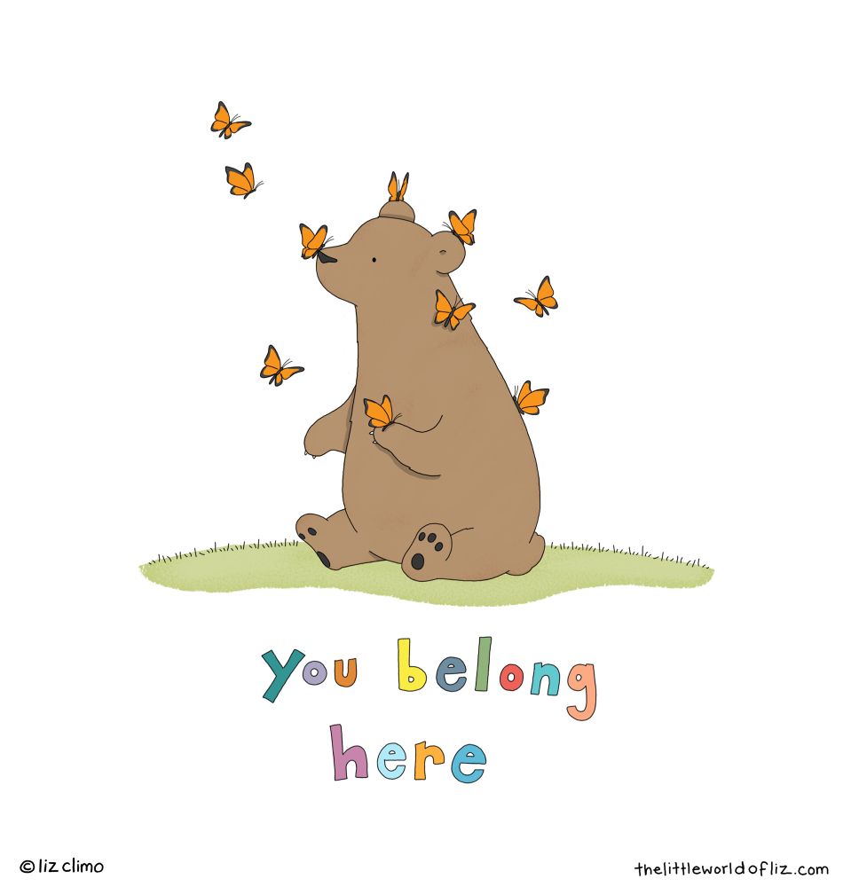 A bear surrounded by monarch butterflies, as they land on him he welcomes them. Text reads: you belong here 