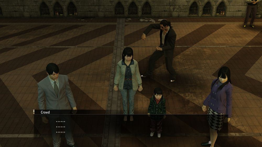Yakuza 0: Majima attempts to distract a crowd with his dance moves. The crowd is unimpressed.