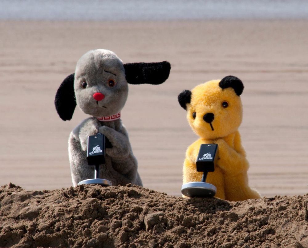 Sweep and sooty hold metal detectors at the beach. Photo courtesy of The Sooty Show. 